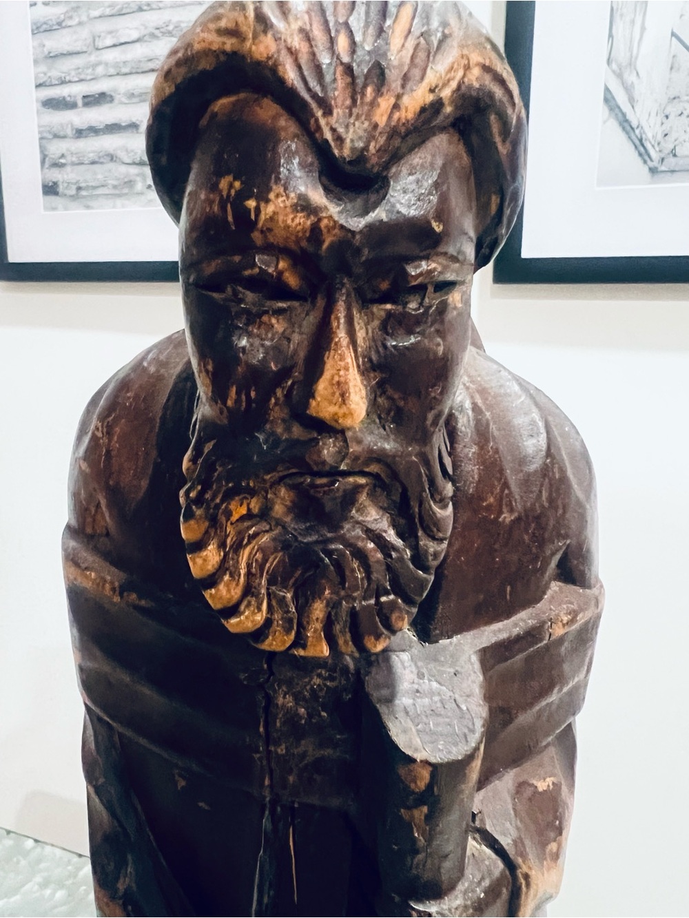 Hand-Carved Wooden Saint Statue in Dark Brown